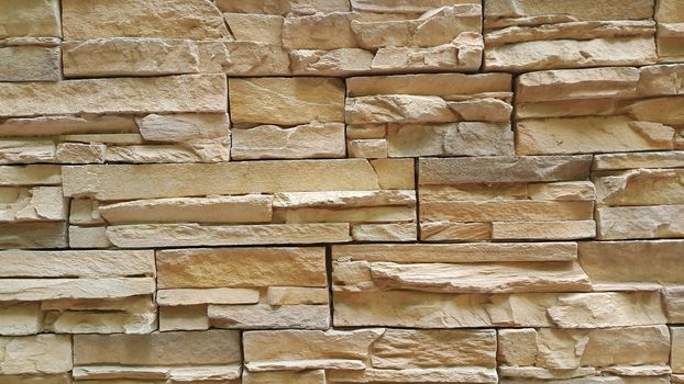 Gray cement stone wall for texture and background abstract. Wall texture with shiny stone put side by side