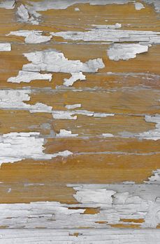 Texture of horizontal wood panels with old paint peeling off