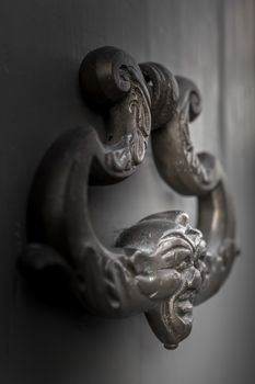 Door Knocker on the door of an old building