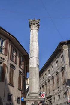 Ancient column dating back to Roman times, isolated with blue sky in the background.