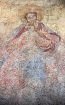 Ancient fresco of the Virgin Mary with the baby Jesus Christ (Religion, faith, eternal life, God, the soul concept).