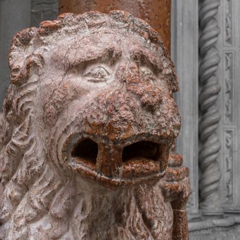 Close up of a marble sculpture depicting a lion.