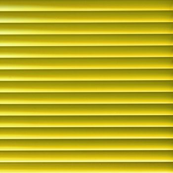 Modern yellow light blinder close up background