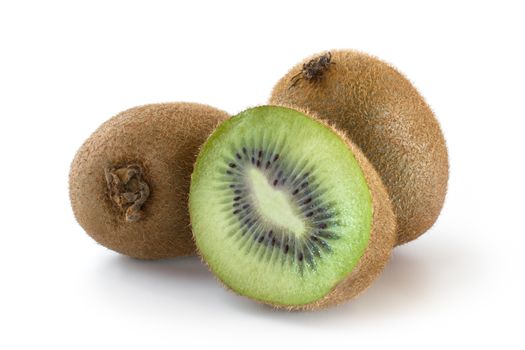 Group consists of three kiwi, one of which cut in half, on white.