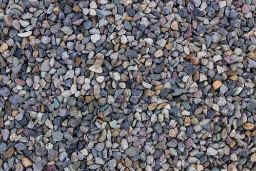 Background of small stones with cool shades.