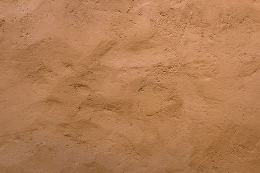 Wall decorated with Venetian plaster and rough plaster.