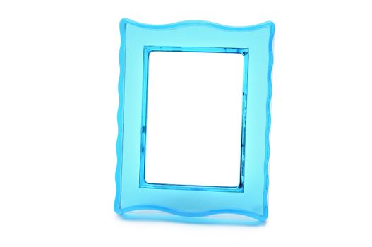 Vintage transparent plastic turquoise color photo frame on an isolated white background.