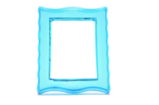 Vintage transparent plastic turquoise color photo frame on an isolated white background.