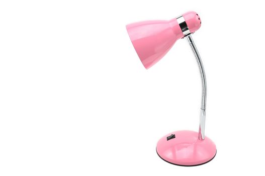 Pink colored table lamp on a white isolated background