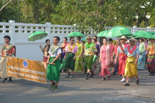 Samut Prakan,Thailand-APRIL 13,2017: Songkran Festival in the Thai-Mon style, featuring a magnificent parade, and see a procession of swan and centipede flags.