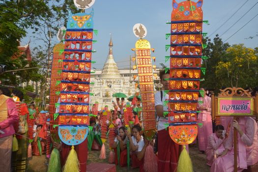 Samut Prakan,Thailand-APRIL 13,2017: Songkran Festival in the Thai-Mon style, featuring a magnificent parade, and see a procession of swan and centipede flags.

