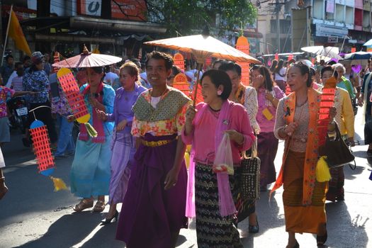 Samut Prakan,Thailand-APRIL 13,2017: Songkran Festival in the Thai-Mon style, featuring a magnificent parade, and see a procession of swan and centipede flags.