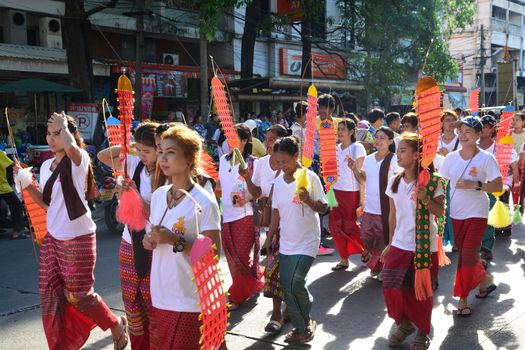 Samut Prakan,Thailand-APRIL 13,2017: Songkran Festival in the Thai-Mon style, featuring a magnificent parade, and see a procession of swan and centipede flags.