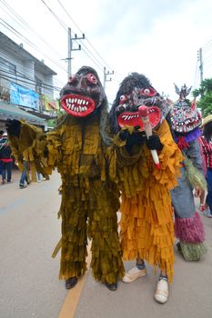 LOEI, THAILAND - JUNE 25, 2017 : Phi Ta Khon is a type of masked procession celebrated on the first day of a three-day Buddhist merit-making holiday known in Thai as Boon Pra Wate