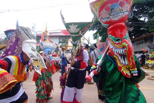 LOEI, THAILAND - JUNE 25, 2017 : Phi Ta Khon is a type of masked procession celebrated on the first day of a three-day Buddhist merit-making holiday known in Thai as Boon Pra Wate