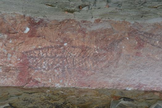 3,000 year-old cliff paintings.
Pha Taem The Prehistorical Painting Cliff Tourist Attraction in Ubonratchathani, Thailand

