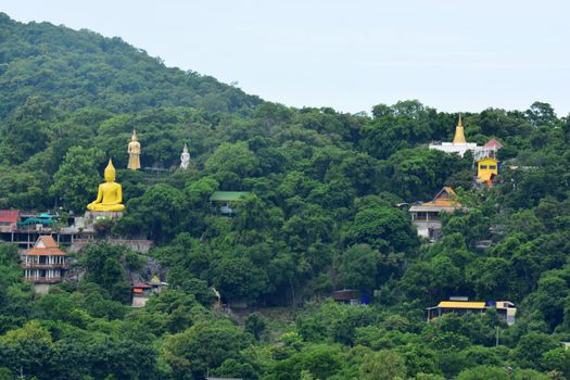 The temple of Wat Tham Yai Prik was first, in 1970, a single house in a limestone cave. Then over the years it has grown while its meditation teacher got famous