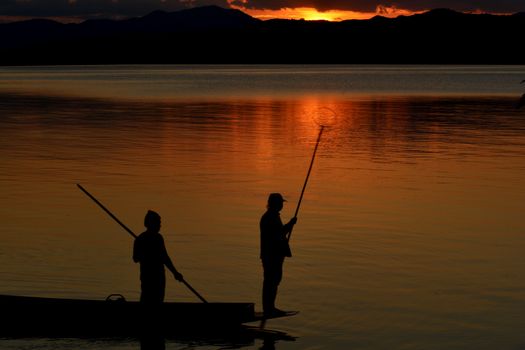 Silhouette of the  beautiful sunset on the boat