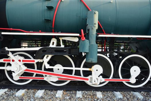 Mechanical part and wheels of the retro steam locomotive, Old Black Steam Locomotive Train with closeup of wheels