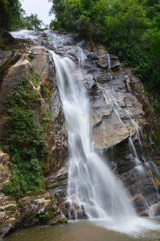 Mae Tia Waterfall Natural beauty of the streams flows gently joins the others and drops to reefs as layers of water that hit the reefs resulting in a terrifying sound inserted by appropriate movement