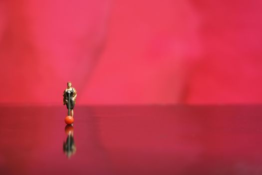 Miniature photography - elegant women singer singing on shiny red stage shiny floor