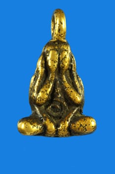 See No Evil Buddha Gold Thai Amulet on blue background, Consecrate By luang phor yui wat bang kapi