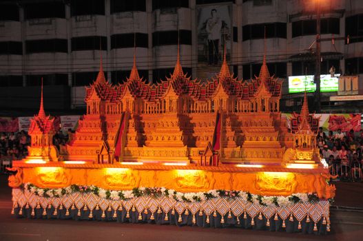 Sakon nakhon ,Thailand – October 23,2018 : Wax Castle Festival is held annually at the end of the Buddhist Lent. The event are objective to pay homage to Phra That Choeng Chum