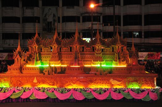 Sakon nakhon ,Thailand – October 23,2018 : Wax Castle Festival is held annually at the end of the Buddhist Lent. The event are objective to pay homage to Phra That Choeng Chum