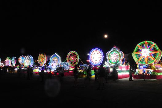 SAKON NAKHON, THAILAND - DEC 23, 2018 :The celebrating Christmas with the dazzling star parade  in Parade of Christmas Star Festival  at Ban Ta Rae

