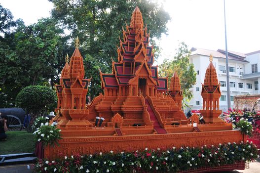 Sakon nakhon ,Thailand – October 23,2018 : Wax Castle Festival is held annually at the end of the Buddhist Lent. The event are objective to pay homage to Phra That Choeng Chum

