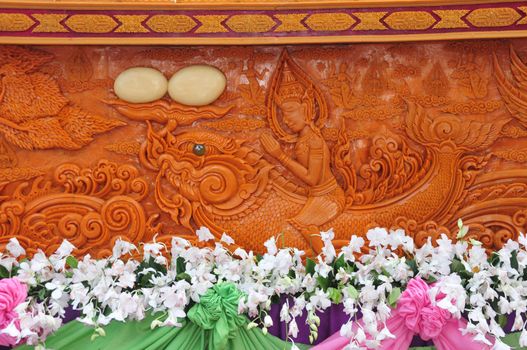 Sakon nakhon ,Thailand – October 23,2018 : Wax Castle Festival is held annually at the end of the Buddhist Lent. The event are objective to pay homage to Phra That Choeng Chum