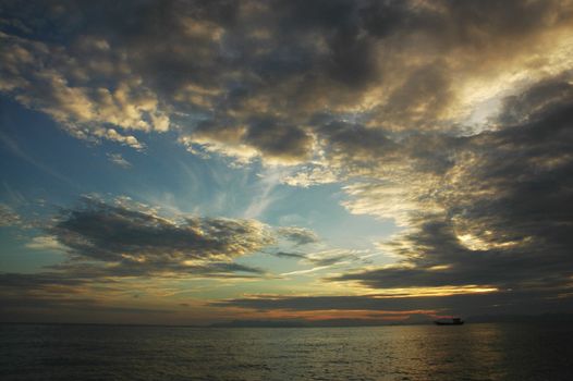 Long tail boat at Sunset on the beach at Andaman sea,Thailand