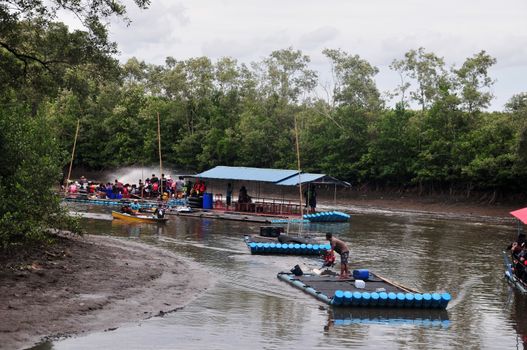 CHANTABURI, LAEM SING, THAILAND – 3 AUGUST 2019 : Bamboo (Substitute materials with tube PVC)  raft Rafting boat Flowing water,Rafting Adventure,travel adventure in the lake of Laem Sing District.