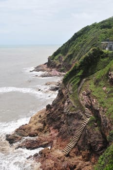 Sea views and mountains with cliffs, old stairs down the cliffs, Perid Island at Laem Sing District, Chanthaburi province, Thailand