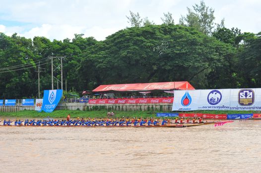 PHICHIT, THAILAND – 7  SEPTEMBER 2019 : Phichit boat racing is a traditional event of long standing. during September each year on the Nan River in front of Wat Tha Luang.