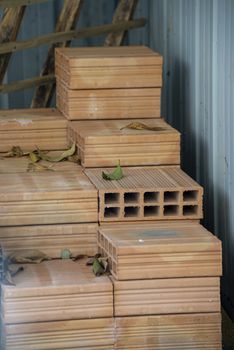 perforated masonry bricks ready for use on a construction site