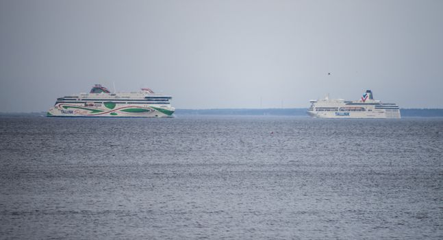 20 April 2019, Tallinn, Estonia. High-speed passenger and car ferrys of the Estonian shipping concern Tallink VICTORIA I and MEGASTAR in the port of Tallinn.