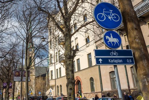 April 22, 2018, Stockholm Sweden. Blue road signs a road for cyclists and a road for riders on a street in Stockholm.