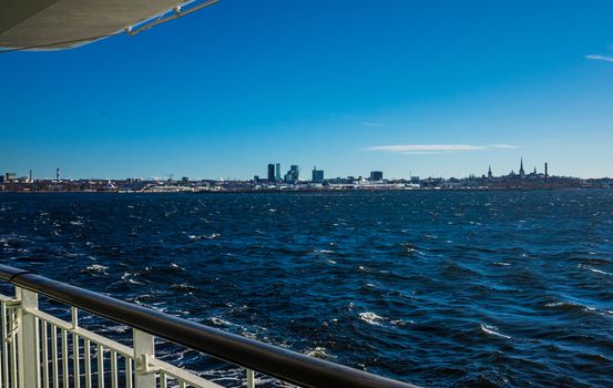 April 21, 2018. Tallinn, Estonia. View of the historic center of Tallinn from the side of a passenger ferry in clear weather.