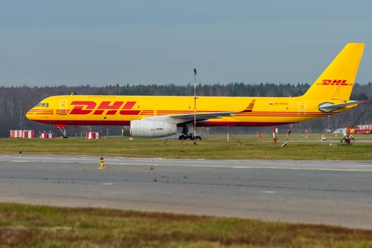 October 29, 2019, Moscow, Russia. Plane 
Tupolev Tu-204 Aviastar Airlines in livery DHL at Sheremetyevo airport in Moscow.