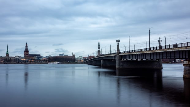 April 24, 2018 Riga, Latvia. View of the Old Town and the automobile bridge over the Daugava in Riga.