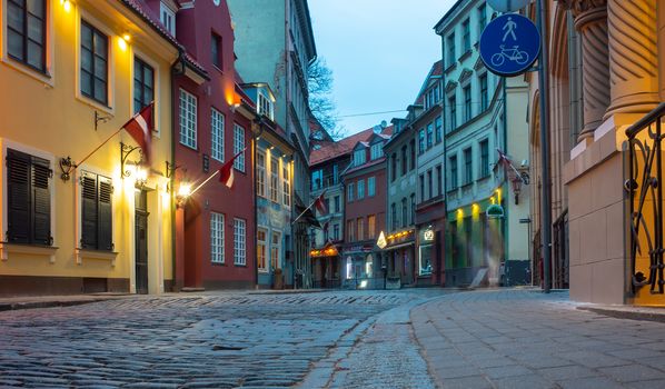 April 24, 2018 Riga, Latvia. Colorful houses on the narrow street of the Old Town in Riga.