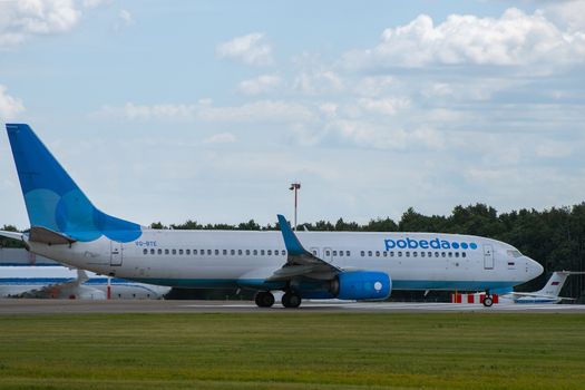 July 2, 2019, Moscow, Russia. Airplane Boeing Boeing 737-800 Pobeda airline at Vnukovo airport in Moscow.