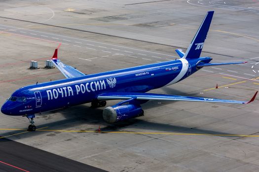 July 2, 2019, Moscow, Russia. Tupolev Tu-204  Aviastar  airline in the blue livery of the company Russian Post at Vnukovo airport in Moscow.