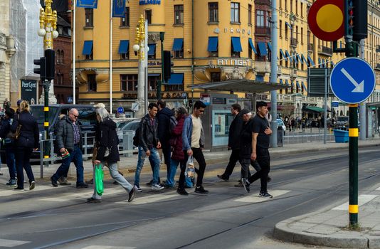 April 22, 2018, Stockholm, Sweden. Passers-by on one of the streets in Stockholm.