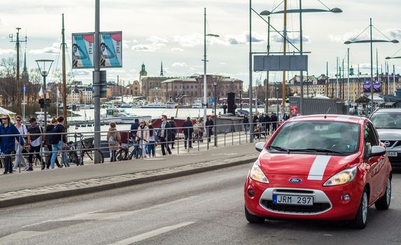 April 22, 2018, Stockholm, Sweden. A red car on one of the streets in Stockholm.