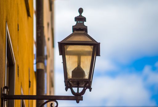 Retro lantern on one of the streets of the Old Town in Stockholm.