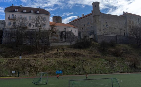 April 21, 2018 Tallinn, Estonia. Football field at the fortress wall of the Old city in Tallinn