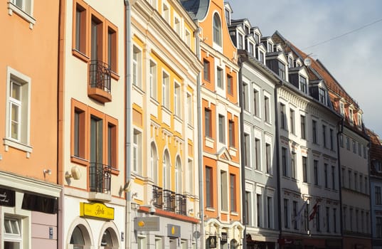April 26, 2018 Riga, Latvia. Colorful houses on the narrow street of the Old Town in Riga.