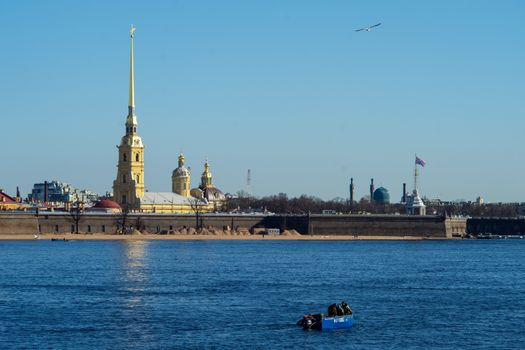 April 29, 2018 Saint Petersburg, Russia. Fishermen in motor boats catch smelt on the Neva river opposite the Peter and Paul fortress.